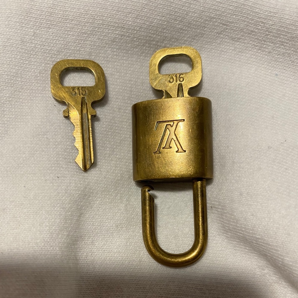 Authentic Louis Vuitton padlock abs keys